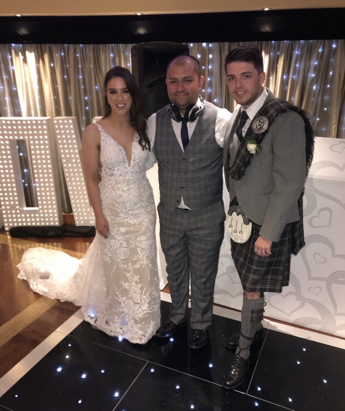 SoulCal wedding DJ with a bride and groom